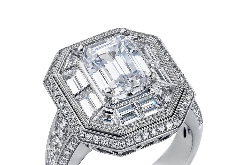 Style	MR2218	<br>	18K white gold ring comprised of 0.80ctw round white diamonds and 1.65ctw baguette diamonds.