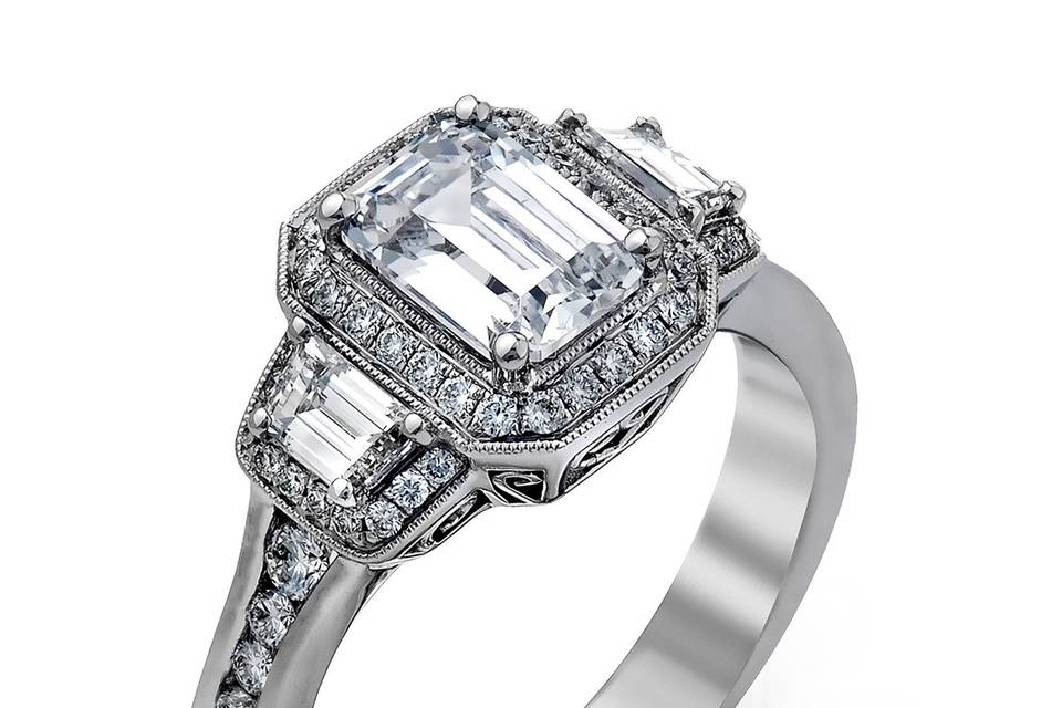 Style	MR2386	<br>	18K white gold ring comprised of 0.33ctw round white diamonds and 0.34ctw triangle diamonds.