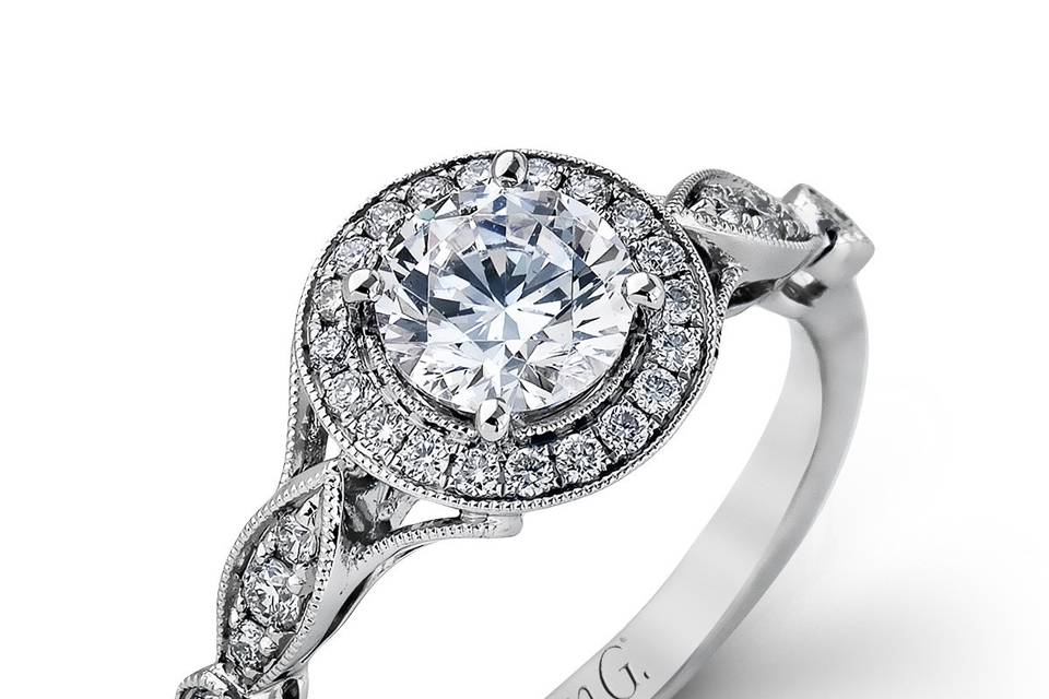 Style	TR523	<br>	18K white gold ring comprised of 0.25ctw round white diamonds.