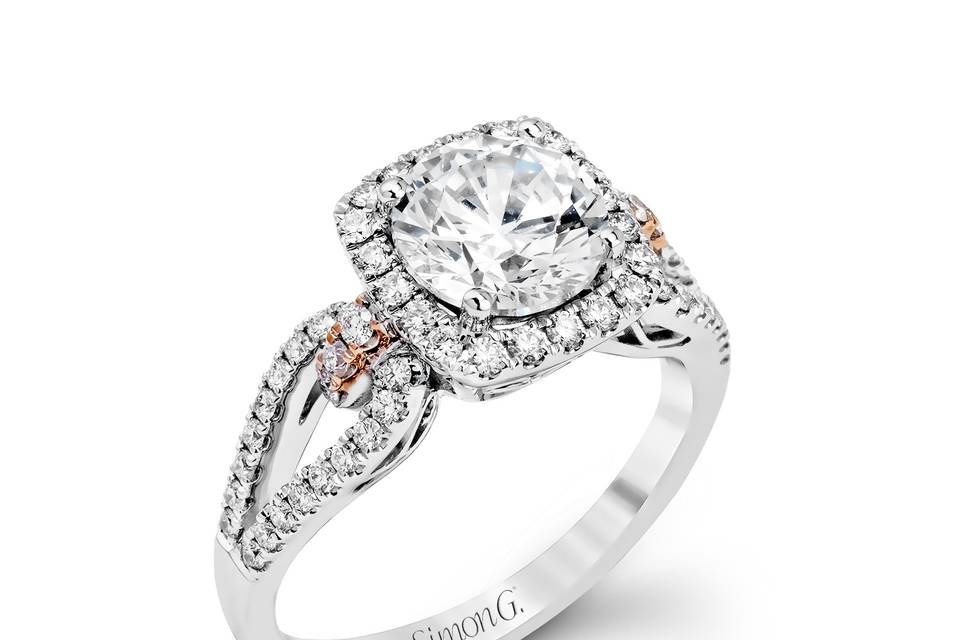 Style MR1828 <br> The delicate romantic design of this vintage inspired white and rose gold engagement ring and wedding band set is accentuated by .45 ctw of white diamonds and .08 ctw of pink diamonds.