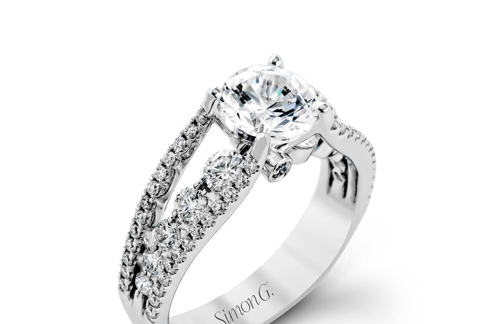 Style MR2248 <br> The lovely vintage style of this white gold engagement ring is further enhanced by .91 ctw of shimmering round cut diamonds.