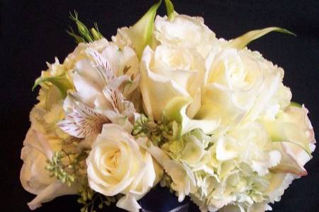 Ivory Bridal Bouquet with roses, hydrangeas, and mini calla lilies. $90