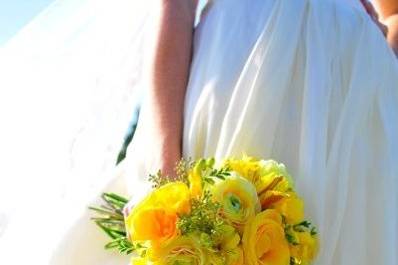 Yellow Blisss with rannunculus, roses, and freesia