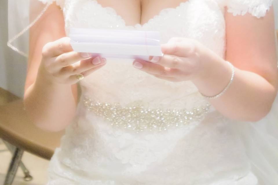 Bride reading groom's letter