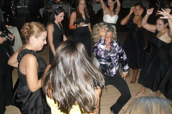 Dancing bride and guests