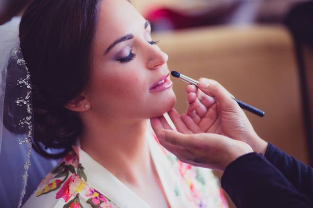 Applying lipstick