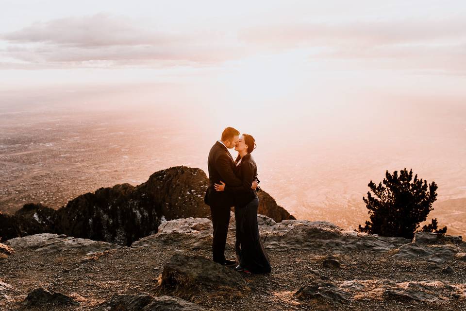 Sandia Mountains cliffside engagement session.