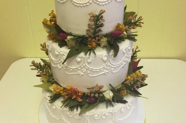 3-tier wedding cake with flowers