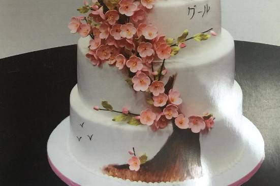 Pink flowers on 5-tier cake