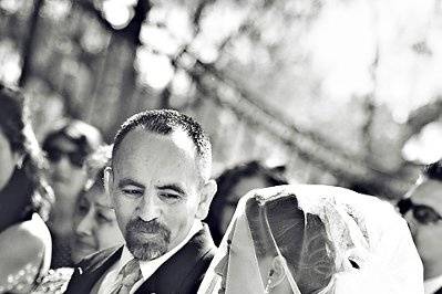 Father walking his daughter down the aisle.