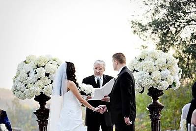 Father walking his daughter down the aisle.