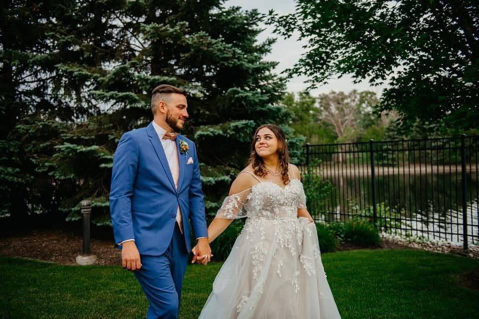 Couple Walking Through Gardens