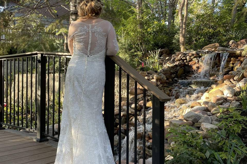 Bride by the Scenic Waterfall