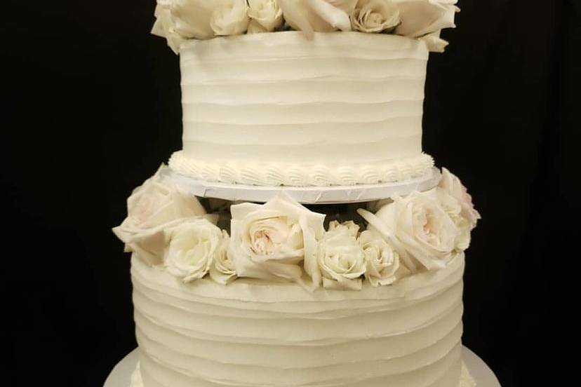 3-tier with flowers and pillar