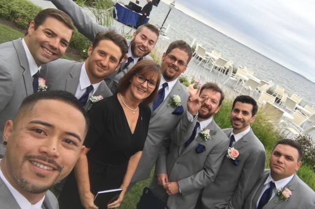 Officiant photo with the groomsmen