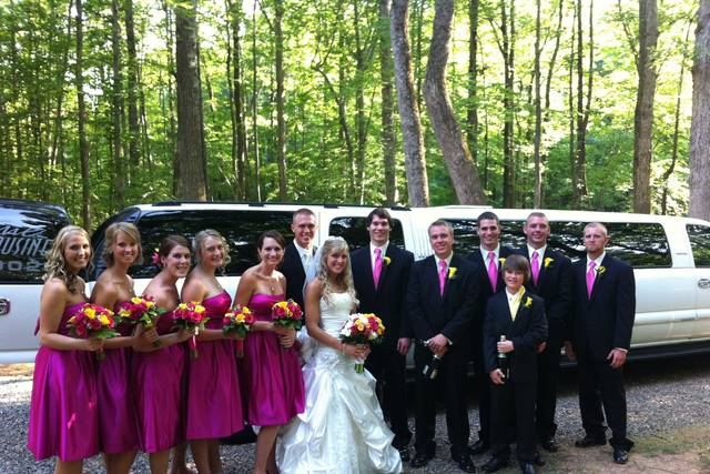 Newlyweds and their wedding party