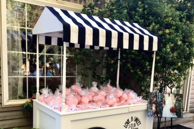 Garden Receptions are the perfect place to add a personal touch with this sweet cart the brides dad made for her 