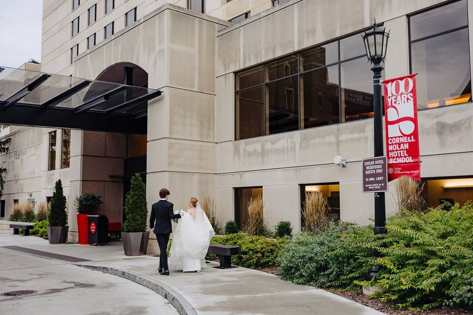 Bride and Groom entering hotel