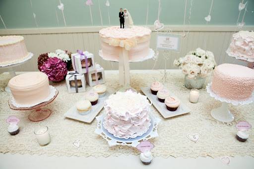 Beautiful deconstructed wedding cake and dessert table.