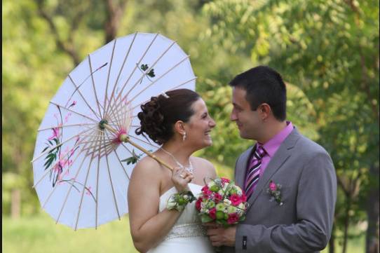 Newlyweds with a parasol