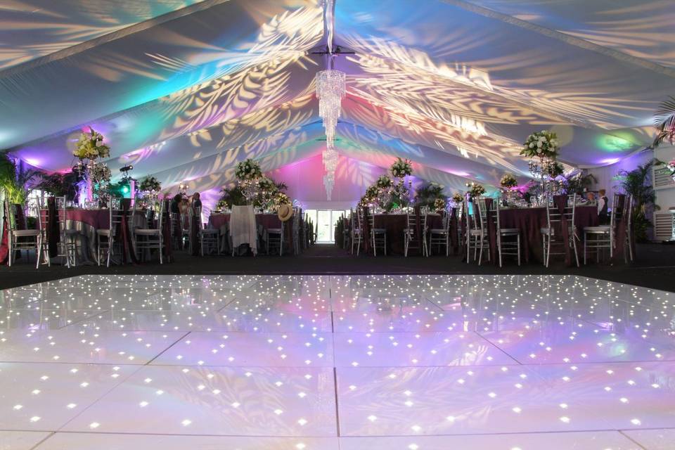 The white starlight dance floor is the highlight of our 1930's inspired wedding design.