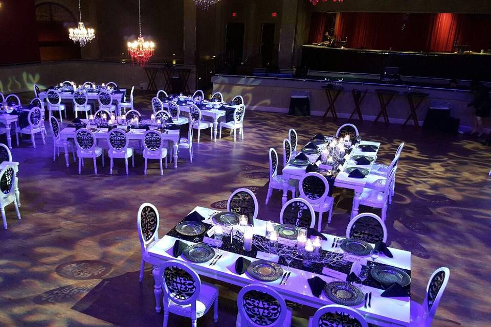 Black and White reception using our white elegance tables and medallion chairs