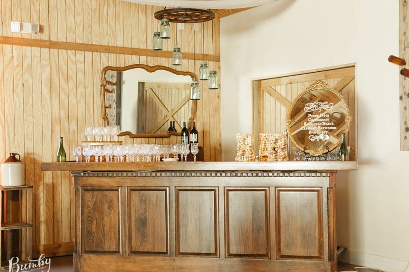 Our vintage bar inside the boathouse reception space. The barn window hinges open to serve the outside patio during cocktail hour.