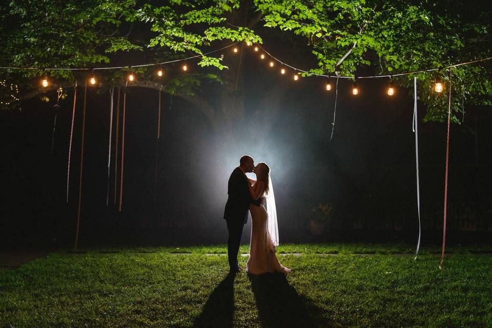A romantic moment under lights