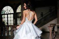 Backless and ruffled wedding dress