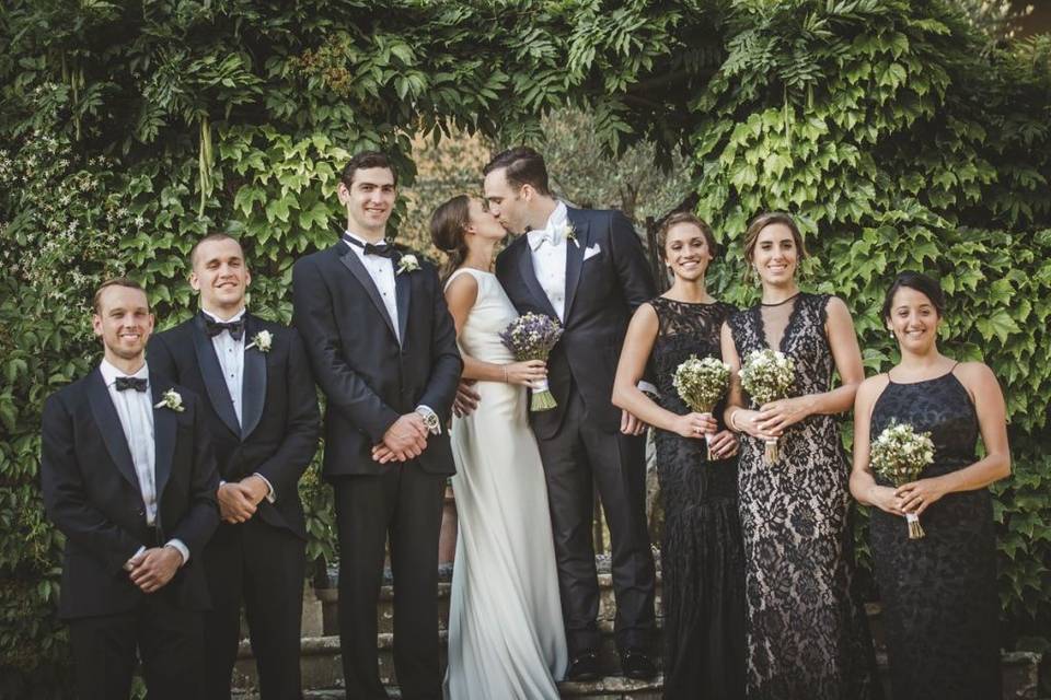 Newlyweds, bridesmaids, and groomsmen