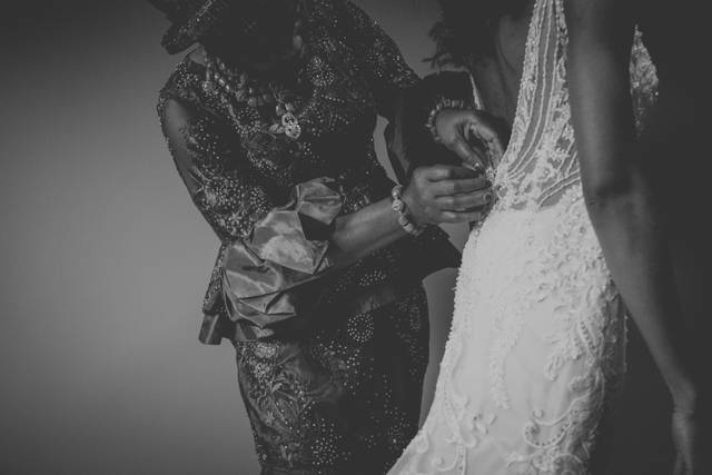 Buttoning the dress