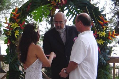 Tropical ceremony arch for beach wedding