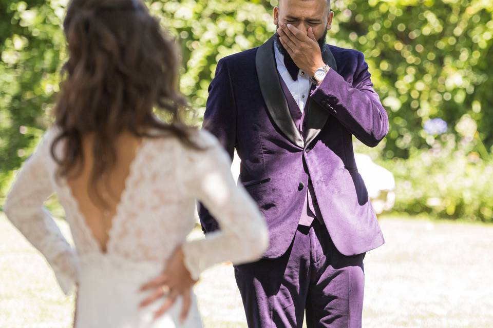 Groom crying, first look.