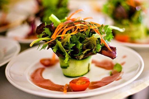 This is ARISTA Catering's signature salad.  It is called the cucumber bundle salad with raspberry vinaigrette www.aristacatering.com