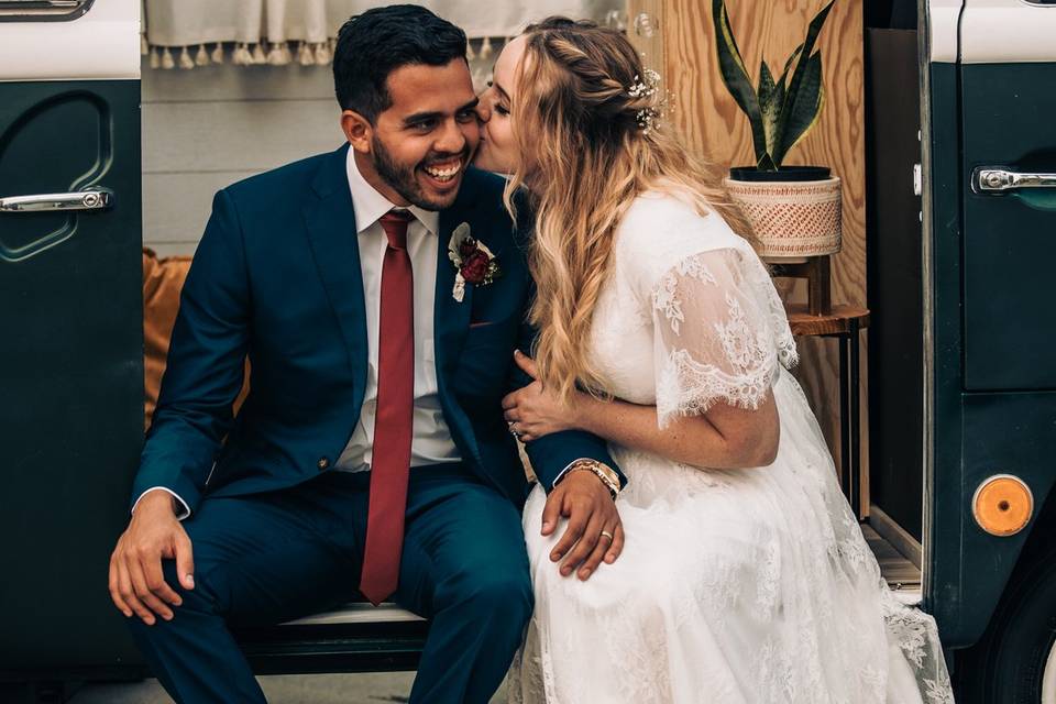 Bride kissing Groom