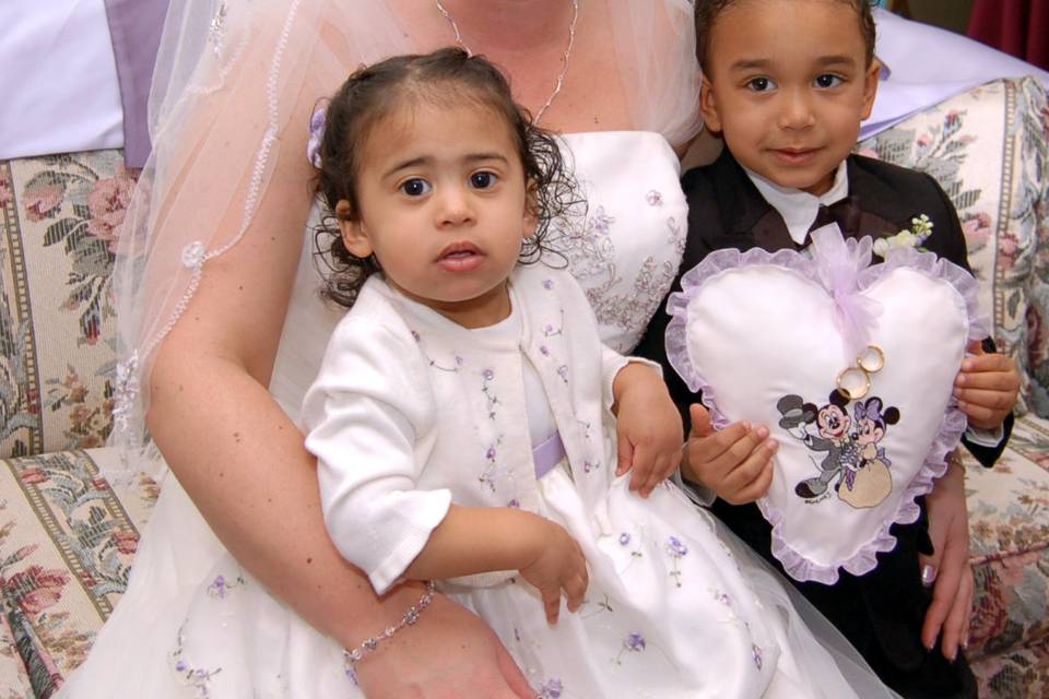 Bride with flower girl & ring