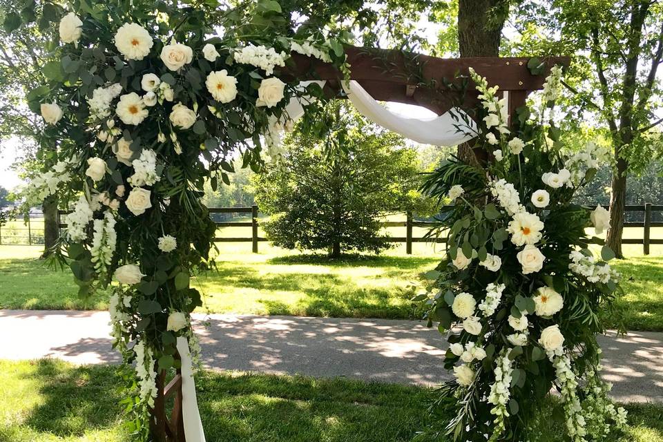 Arbor with floral and draping