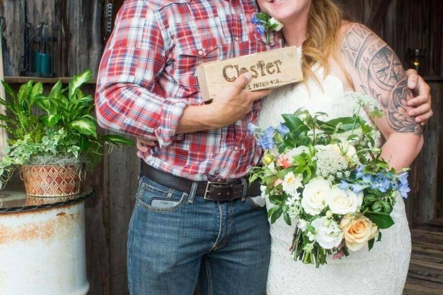 Couple holding a sign