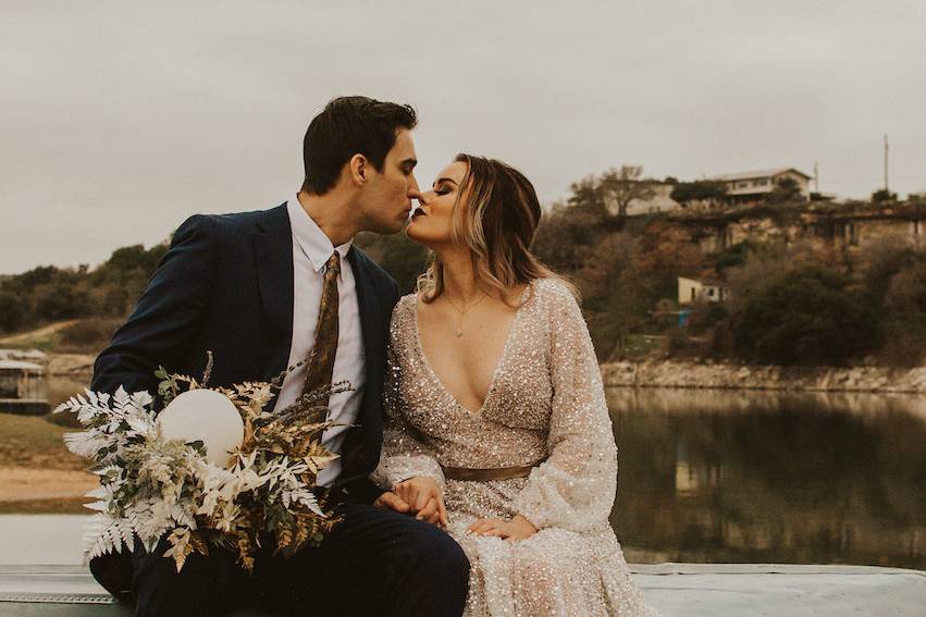 Bride and groom kiss