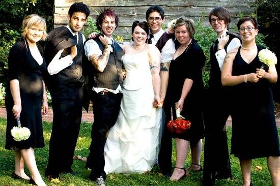 the bridal party shows off their tattoos