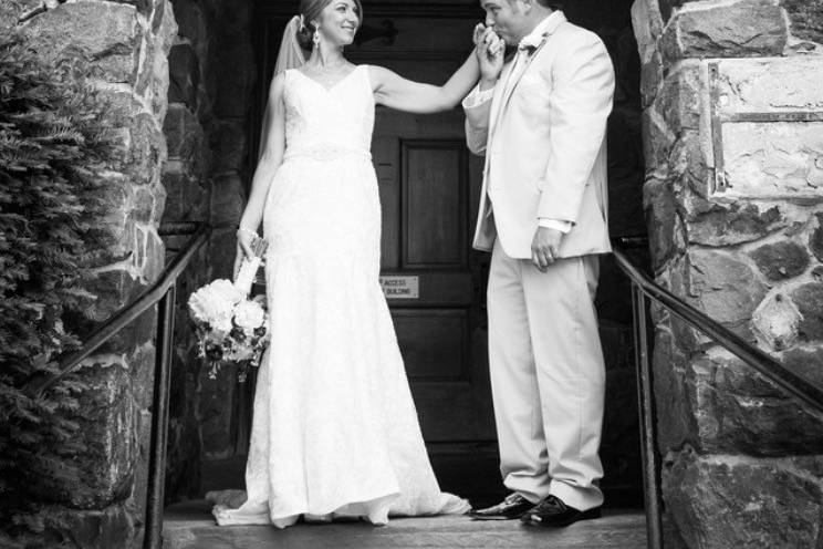 Roycroft Couple standing outside The Royroft Chapel.