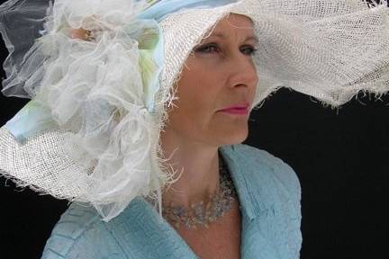 white hat with jewelled tulle flowers