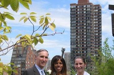 The couple with the officiant