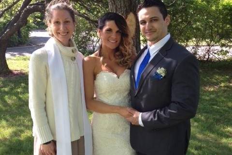 The couple with the officiant