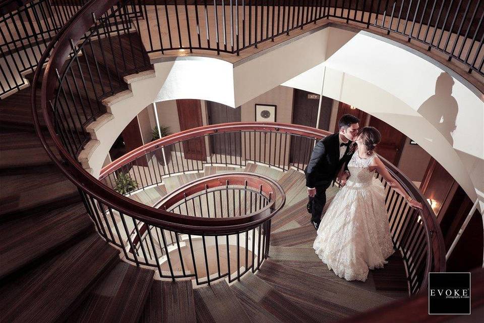 Bride and groom on stairwell