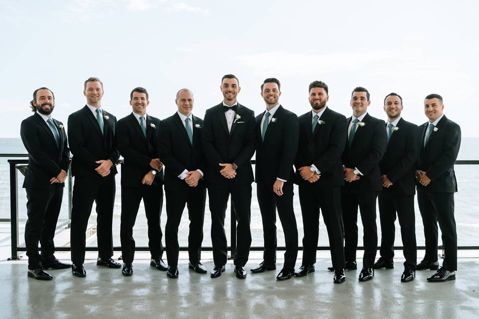 Groomsmen on balcony