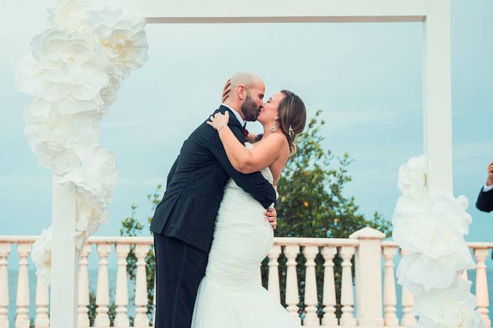 Modern romantic ceremony under our Camellia Structure