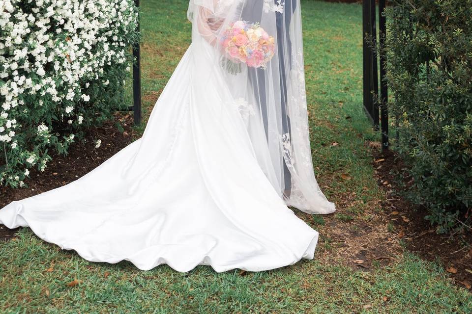 Wedding couple kiss under veil
