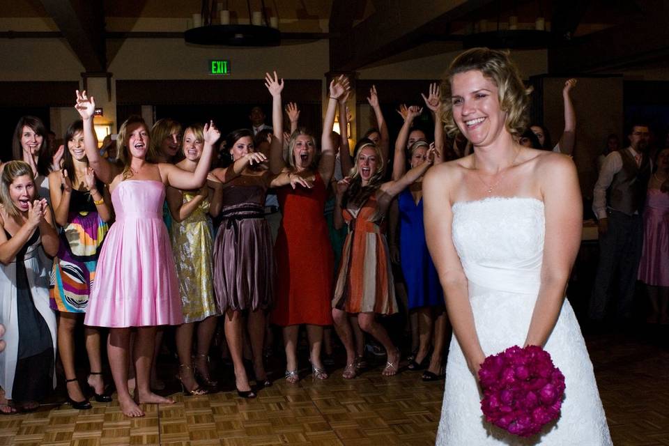 Bride tossing her bouquet