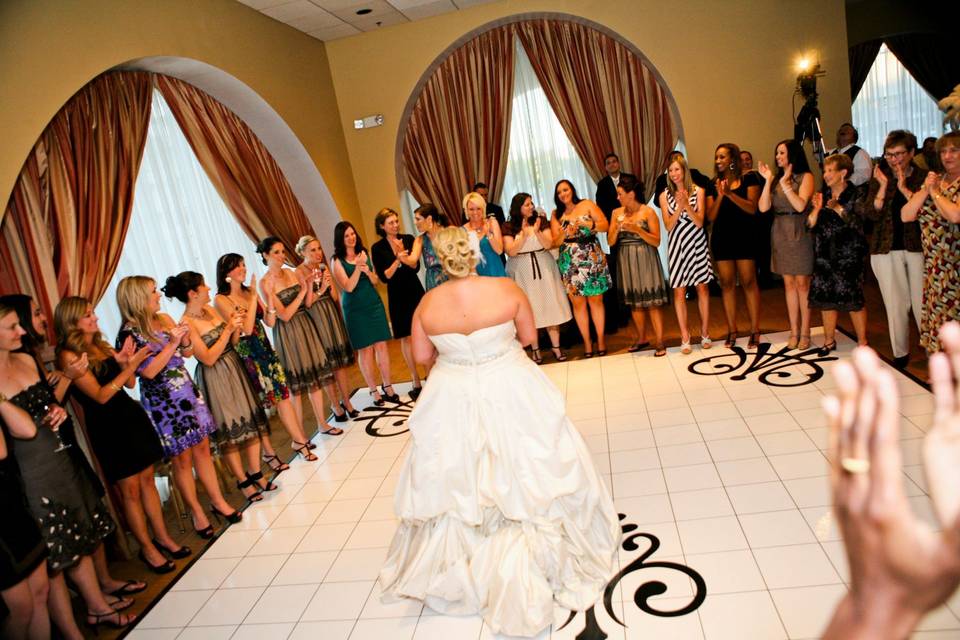 Wedding crowd surrounding the bride